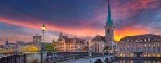 Panorama von Zürich im Sonnenuntergang als Motivation Singles in Zürich kennenzulernen